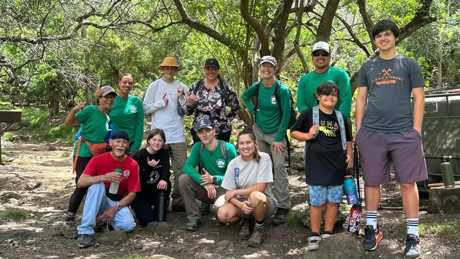 Volunteers planting native trees with Aloha Tree Alliance