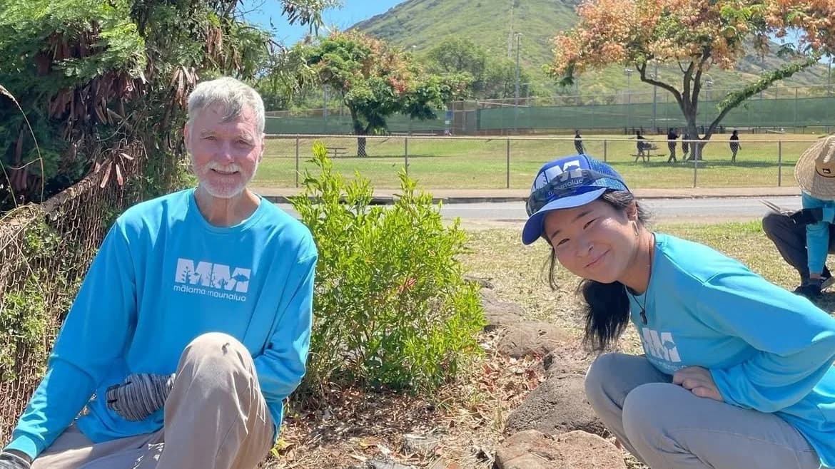 Volunteer leading a community project with other participants