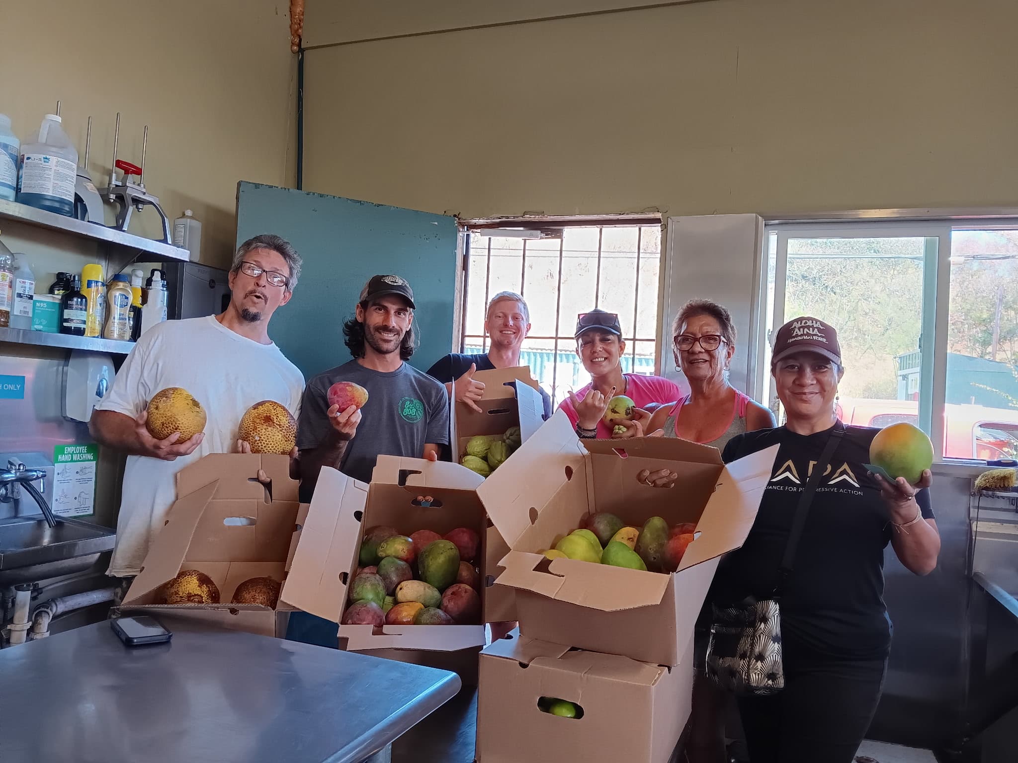 Volunteer to wash produce at CGC Headquarters